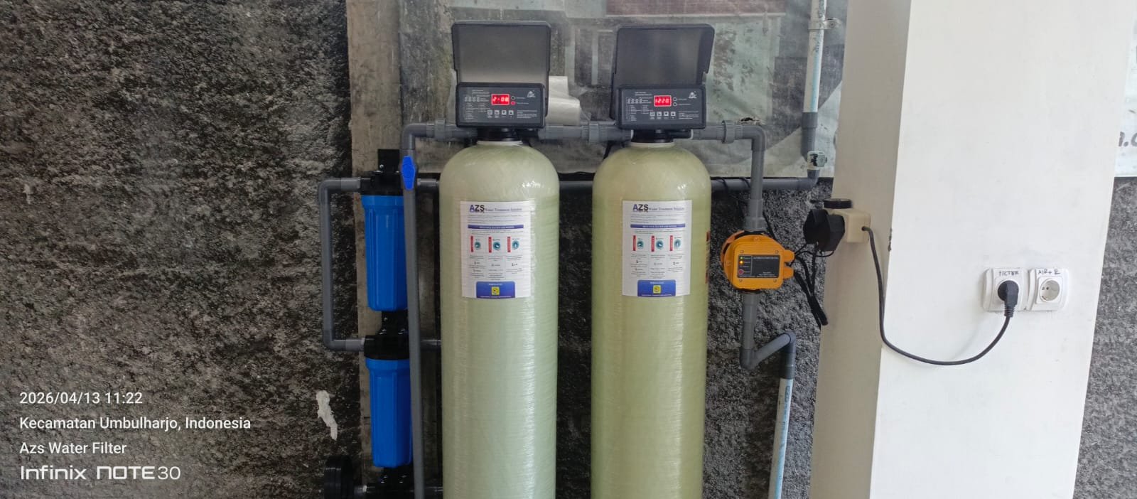 tabung filter air 1054 oleh azs water filter yang terpasang di tempat konsumen
