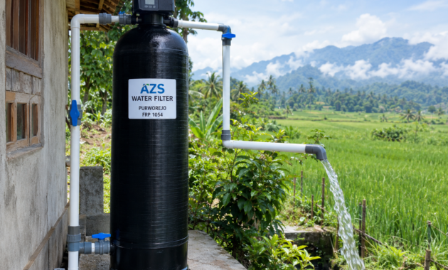 Jasa pasang filter air Purworejo unit tabung FRP 1054 terpasang rapi di area luar rumah